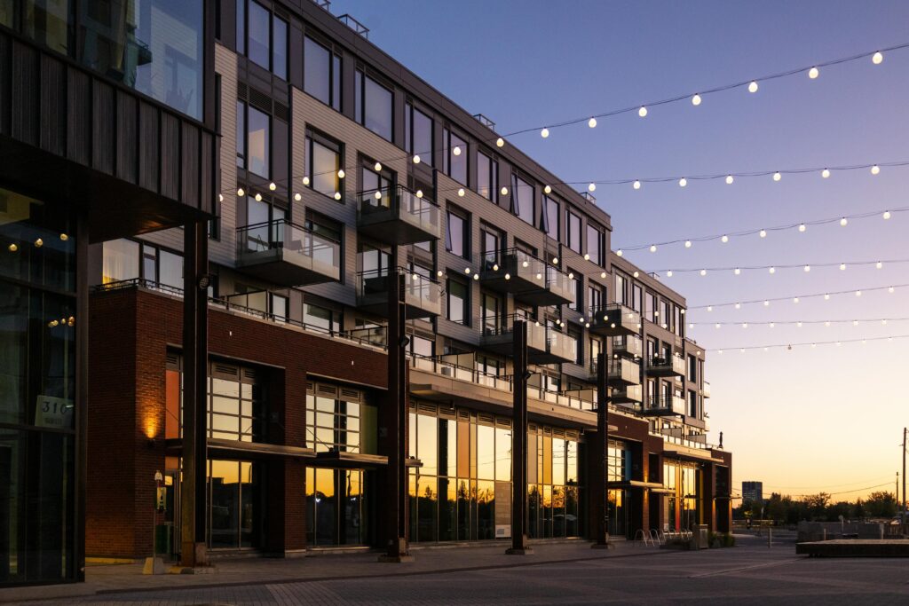 Modern Urban Building at Sunset with Lights